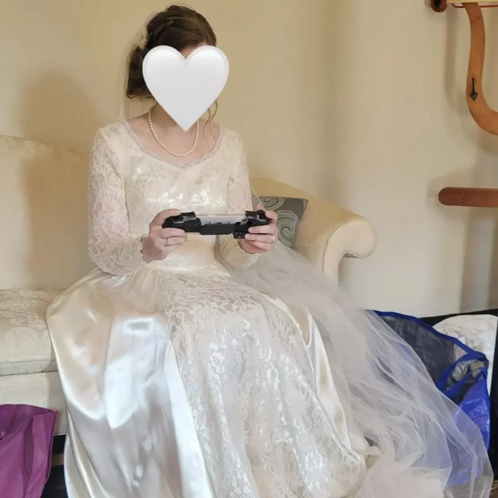 Bride Plays Genshin Impact While Waiting for Wedding to Begin